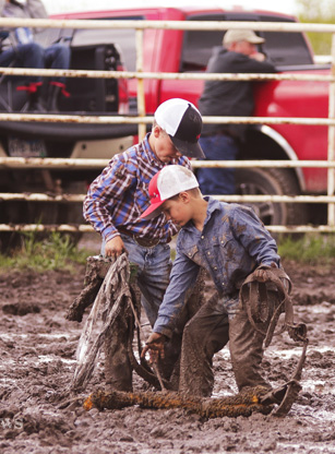 Hard working help picking up our bucking dummies at the Waln Ranch n Rodeo in South Dakota.